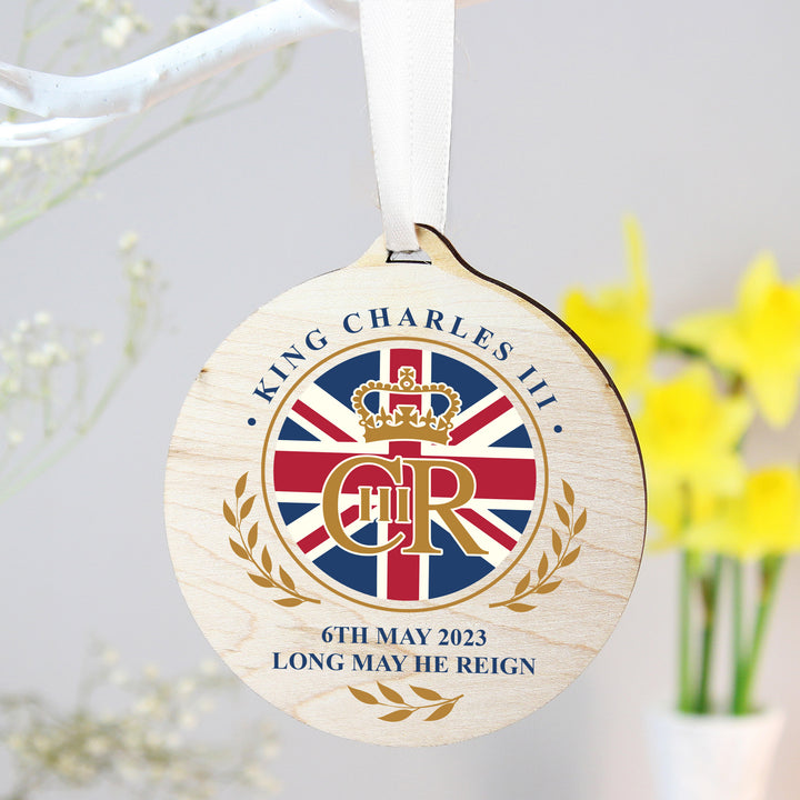 Buy King Charles III Union Jack Coronation Commemorative Round Wooden Decoration available now at www.giftsfinder.co.uk