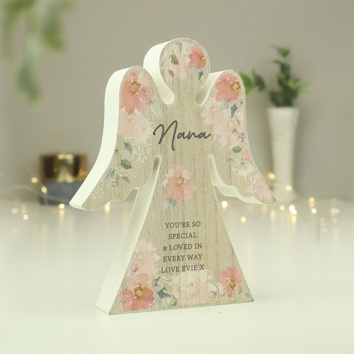 Buy Personalised Floral Wooden Angel Ornament available now at www.giftsfinder.co.uk