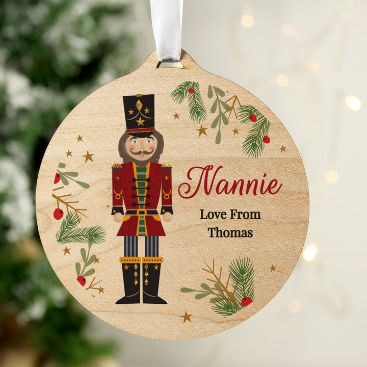 Buy Personalised Christmas Nutcracker Wooden Bauble available now at www.giftsfinder.co.uk