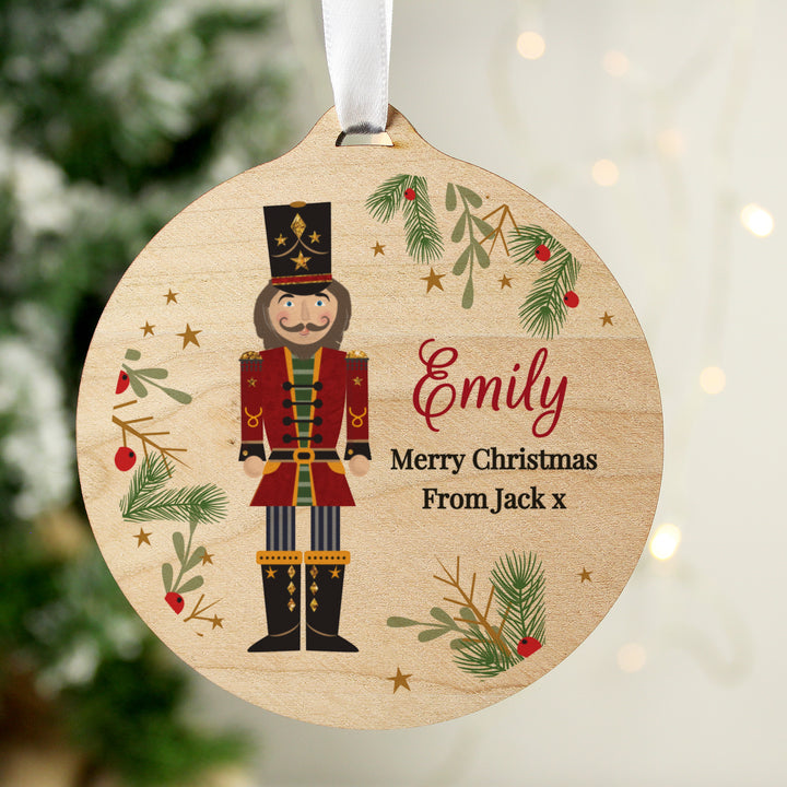 Buy Personalised Christmas Nutcracker Wooden Bauble available now at www.giftsfinder.co.uk