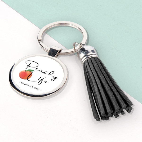 Buy Peachy Life Tassle Keyring available now at www.giftsfinder.co.uk