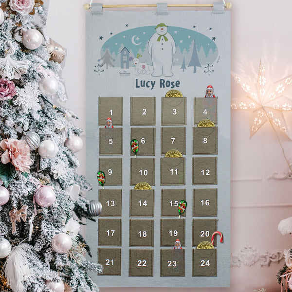 Personalised 2024 The Snowman and the Snowdog Advent Calendar In Silver Grey available to buy at www.giftsfinder.co.uk