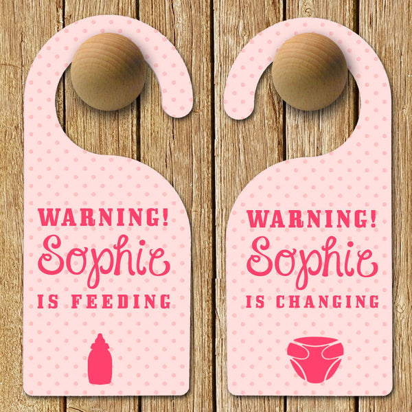 Buy Personalised Baby Warning Door Hanger in Pink available now at www.giftsfinder.co.uk