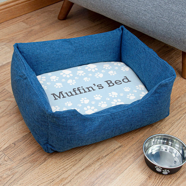 Buy Personalised Blue Comfort Dog Bed with Blue Paw Print Design available now at www.giftsfinder.co.uk