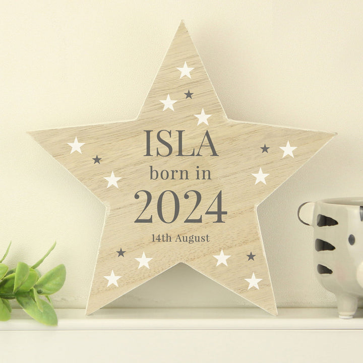 Personalised Born In Wooden Star Ornament available to buy at www.giftsfinder.co.uk