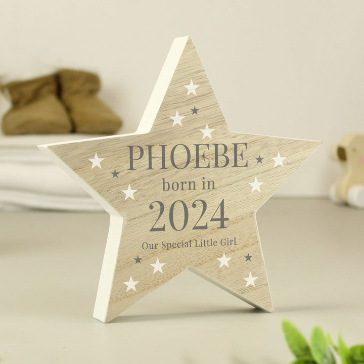 Personalised Born In Wooden Star Ornament available to buy at www.giftsfinder.co.uk