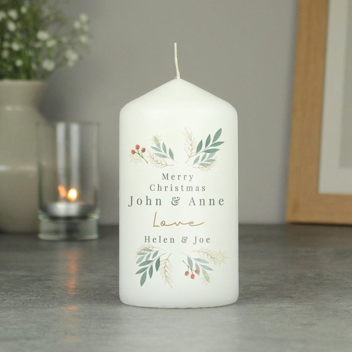 Personalised Christmas Foliage Pillar Candle available to buy at www.giftsfinder.co.uk