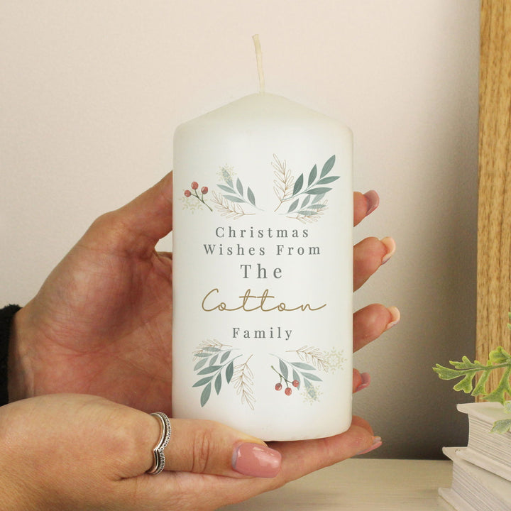 Personalised Christmas Foliage Pillar Candle available to buy at www.giftsfinder.co.uk