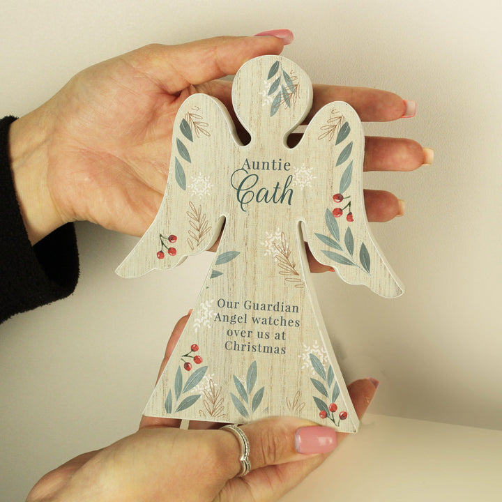 Personalised Christmas Foliage Wooden Angel Ornament available to buy at www.giftsfinder.co.uk