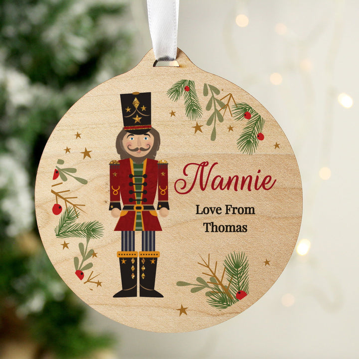 Personalised Christmas Nutcracker Wooden Bauble available to buy at www.giftsfinder.co.uk