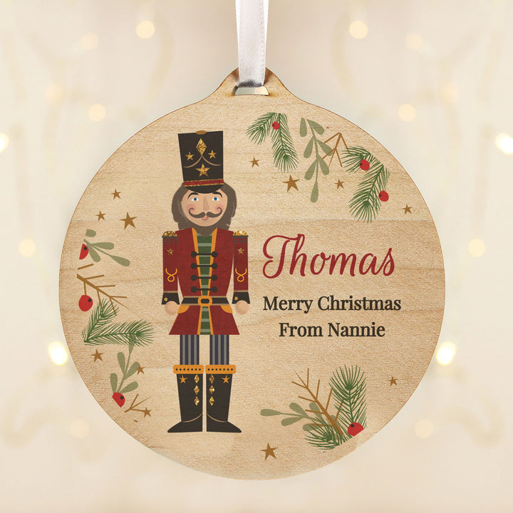 Personalised Christmas Nutcracker Wooden Bauble available to buy at www.giftsfinder.co.uk