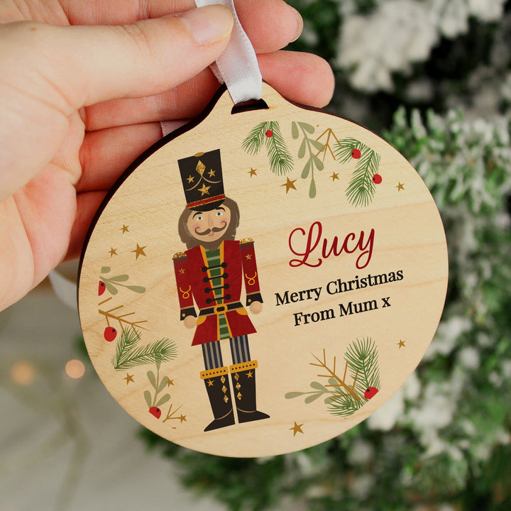 Personalised Christmas Nutcracker Wooden Bauble available to buy at www.giftsfinder.co.uk