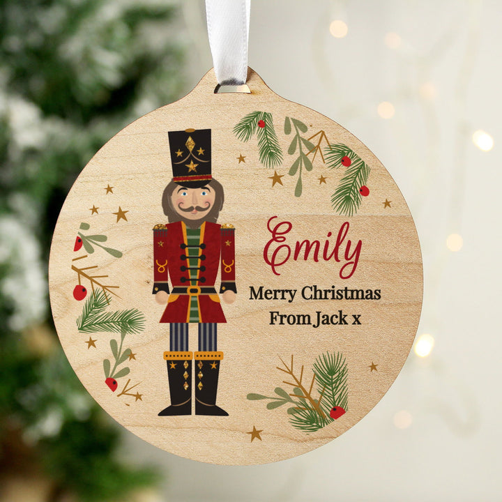 Personalised Christmas Nutcracker Wooden Bauble available to buy at www.giftsfinder.co.uk