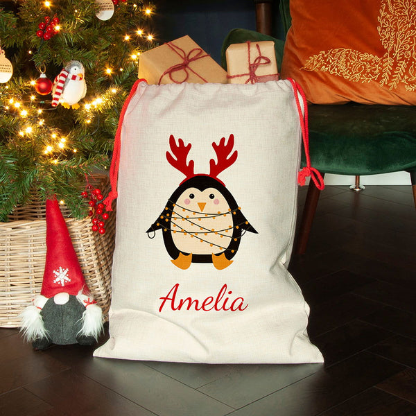 Personalised Christmas Penguin Christmas Sack available to buy at www.giftsfinder.co.uk