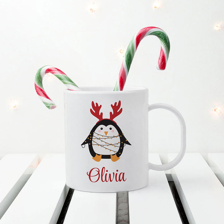 Personalised Christmas Penguin Kids Polymer Mug available to buy at www.giftsfinder.co.uk