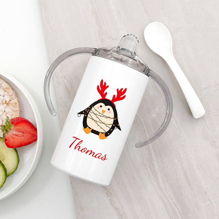 Personalised Christmas Penguin Kids Sippy Cup available to buy at www.giftsfinder.co.uk