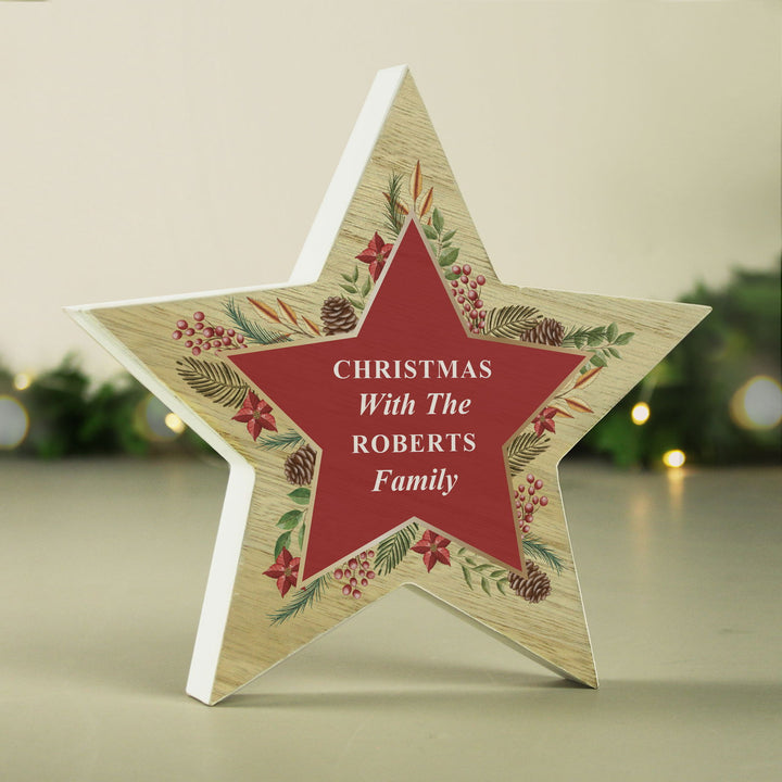 Personalised Christmas Wreath Wooden Star Ornament available to buy at www.giftsfinder.co.uk