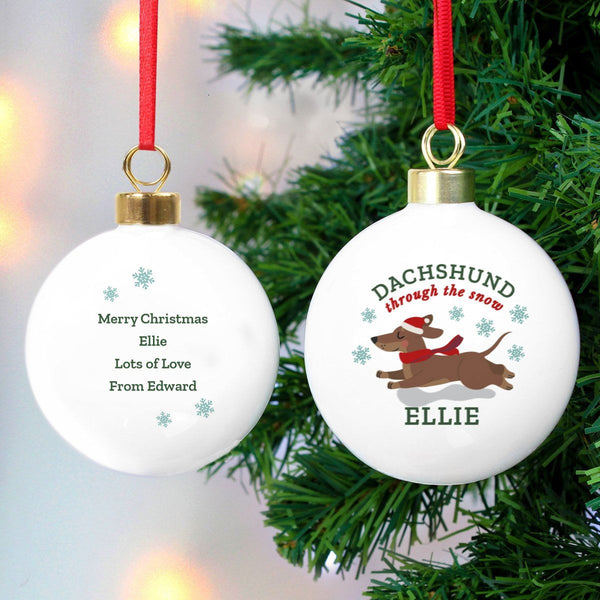 Buy Personalised 'Dachshund Through The Snow' Christmas Tree Bauble available now at www.giftsfinder.co.uk