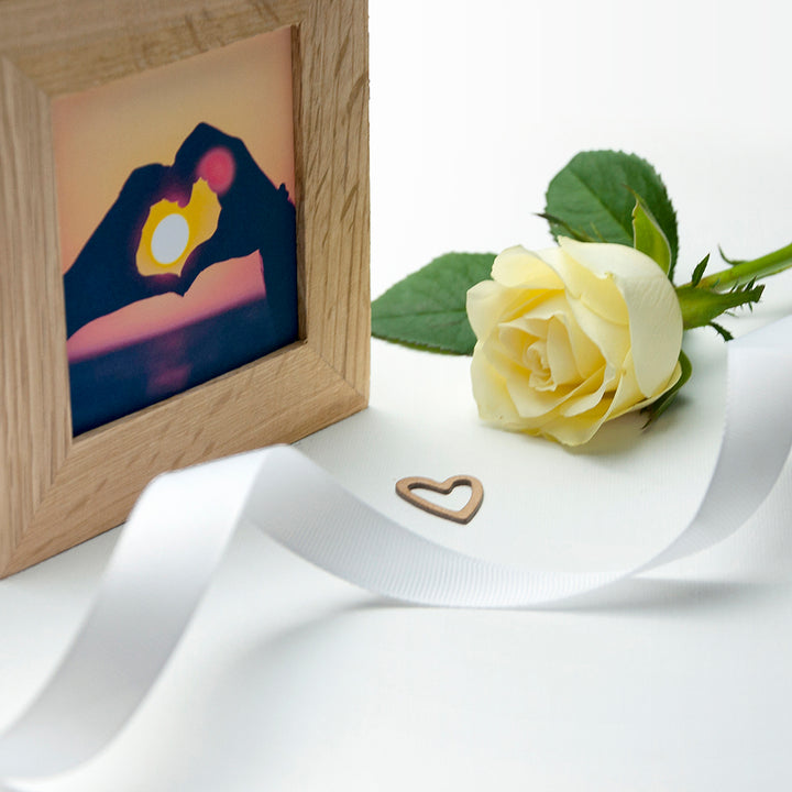 Buy Personalised Carved Heart Oak Photo Cube at www.giftsfinder.co.uk