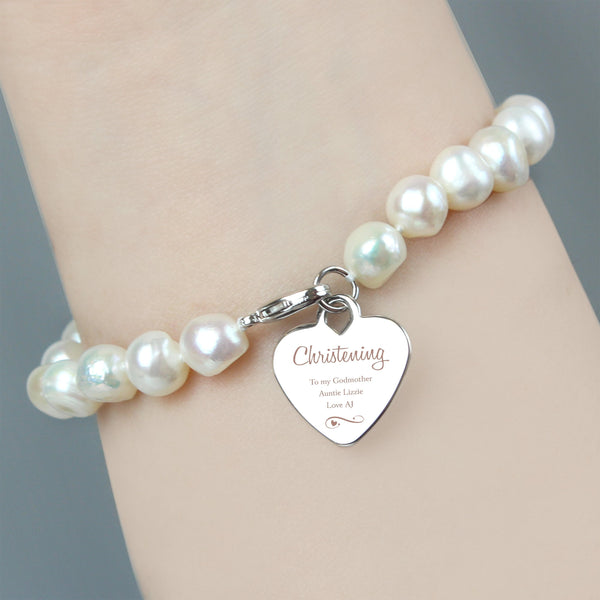 Buy Personalised Christening Swirls & Hearts White Freshwater Pearl Bracelet available now at www.giftsfinder.co.uk