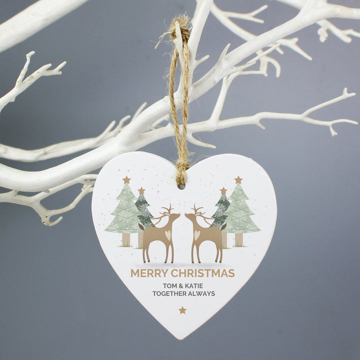 Personalised Reindeer Couple Wooden Heart Decoration in gift category 