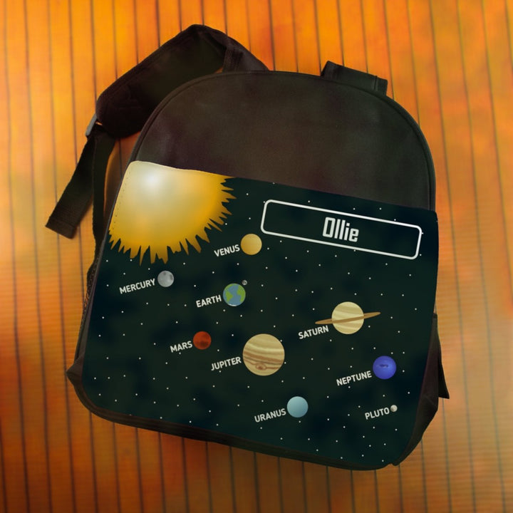 Buy Printed Kids Black Backpack with Solar System Design, Customise with Any Name from www.giftsfinder.co.uk