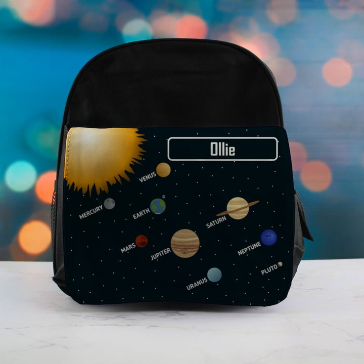 Buy Printed Kids Black Backpack with Solar System Design, Customise with Any Name from www.giftsfinder.co.uk