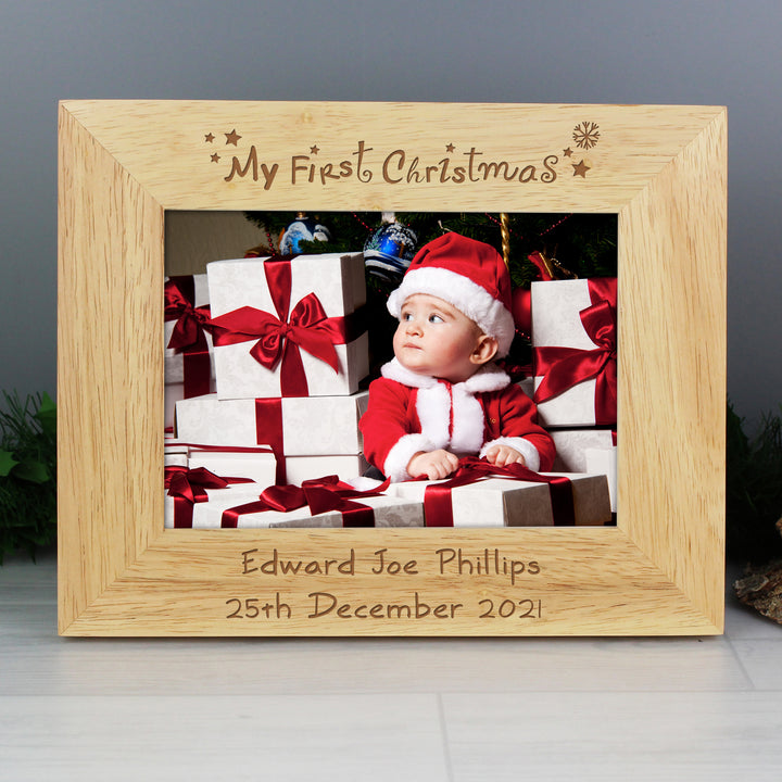 Buy Personalised My First Christmas 5x7 Landscape Wooden Photo Frame at www.giftsfinder.co.uk