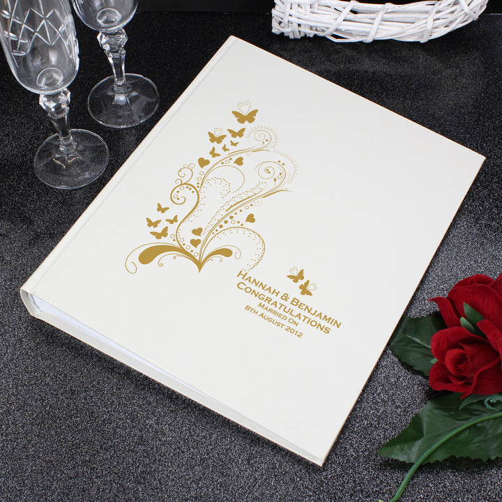 Buy Personalised Gold Butterfly Swirl Traditional Photo Album available now at www.giftsfinder.co.uk