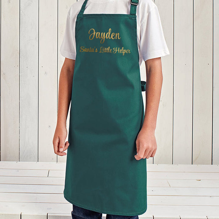 Personalised Santas Little Helper Childrens Green Waterproof Apron in gift category Personalised Placemats