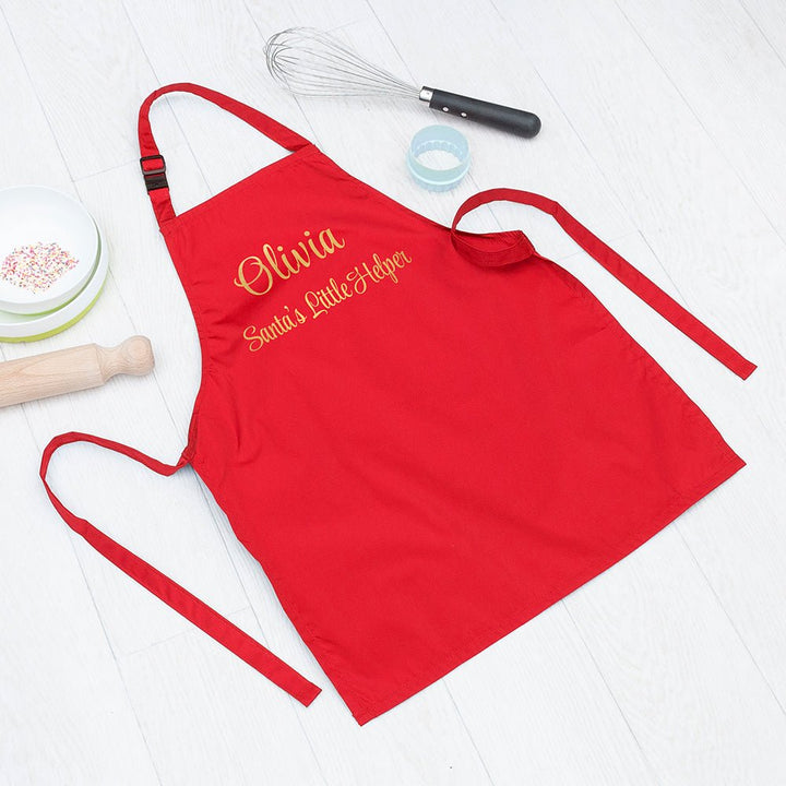 Personalised Santas Little Helper Childrens Red Waterproof Apron in gift category 