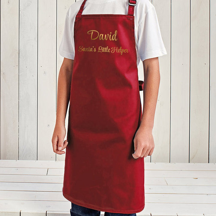 Personalised Santas Little Helper Childrens Red Waterproof Apron in gift category Personalised Placemats